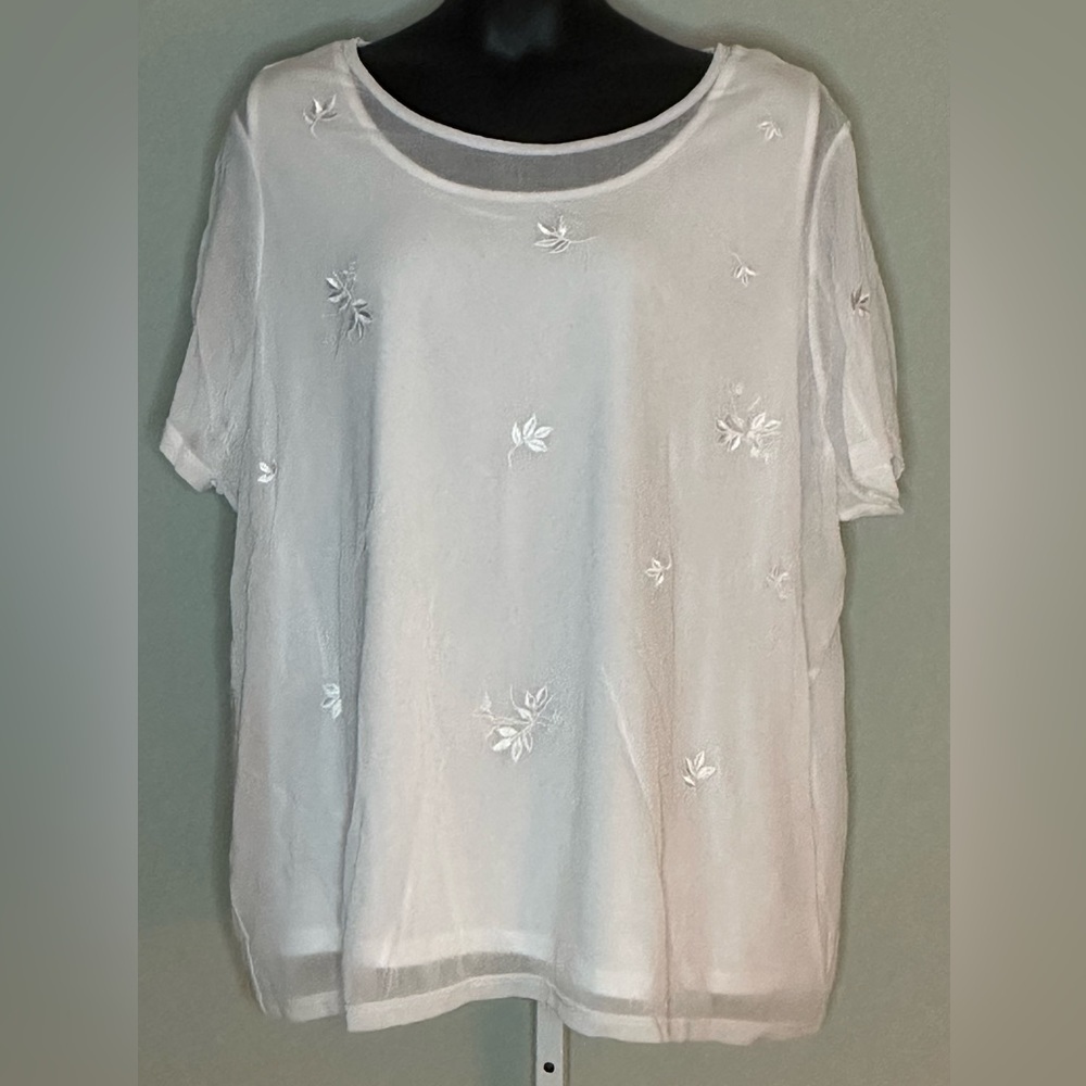 Avenue blouse. Size 30/32. White with flowers embroidered on.